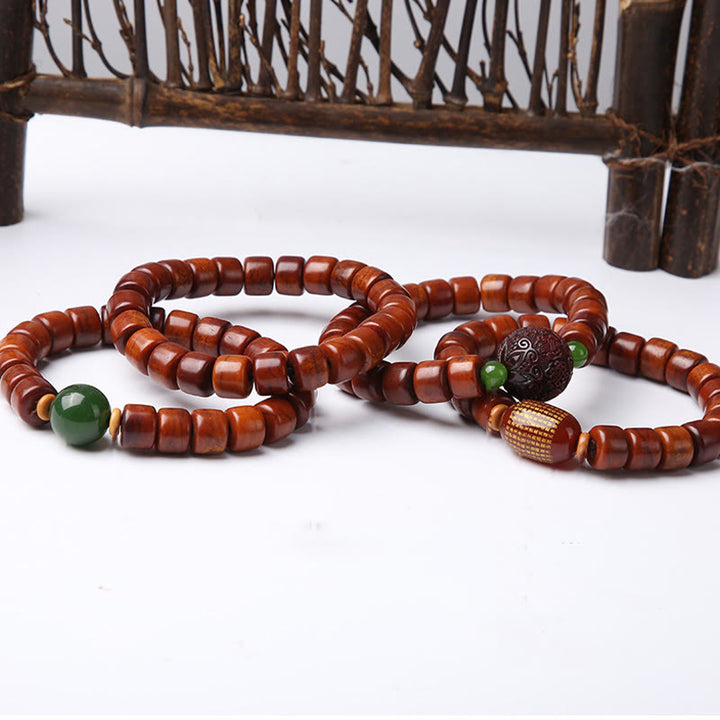 Buddha Stones Tibetan Bone Beads Three-Eyed Dzi Bead Sheep Horn Red Agate Strength Bracelet - image 1