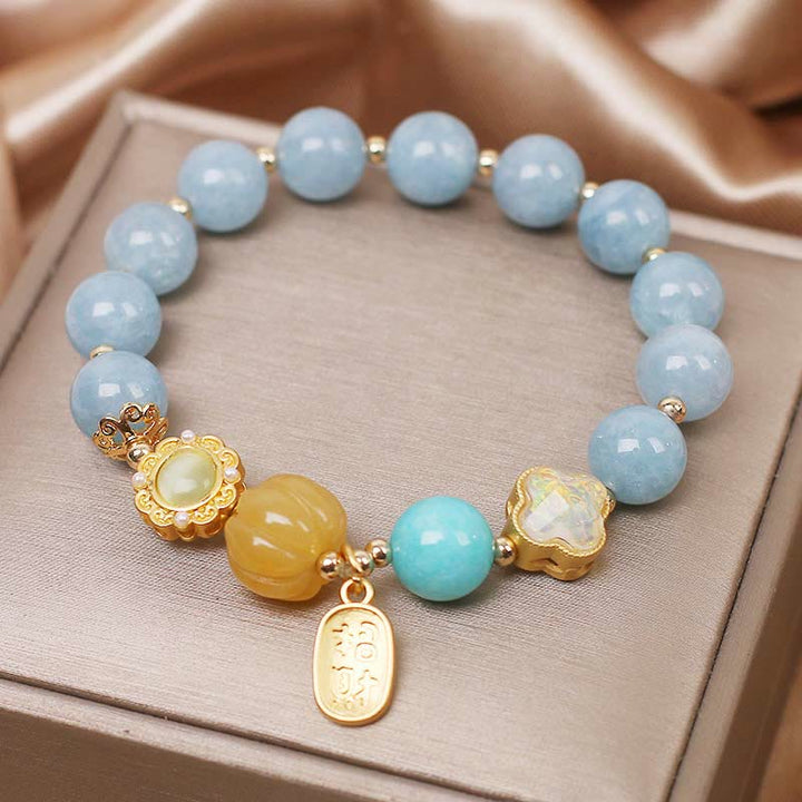 Buddha Stones Aquamarine Pumpkin Pearl Wealth Protection Bracelet - image 1