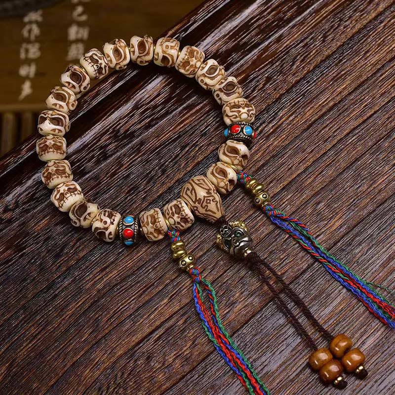 Buddha Stones Tibetan Camel Bone Garuda Carved Protection Tassel Bracelet - image 1