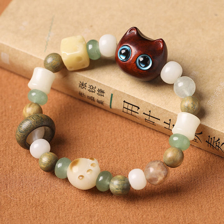 Buddha Stones Bodhi Seed Green Sandalwood Ebony Wood Small Leaf Red Sandalwood Cat Head Paw Claw Peace Bracelet - image 10