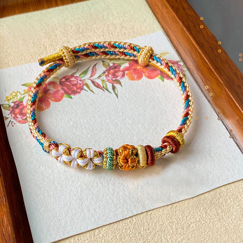Buddha Stones Handmade Dunhuang Color Peach Blossom Pattern Braid String Bracelet - image 1