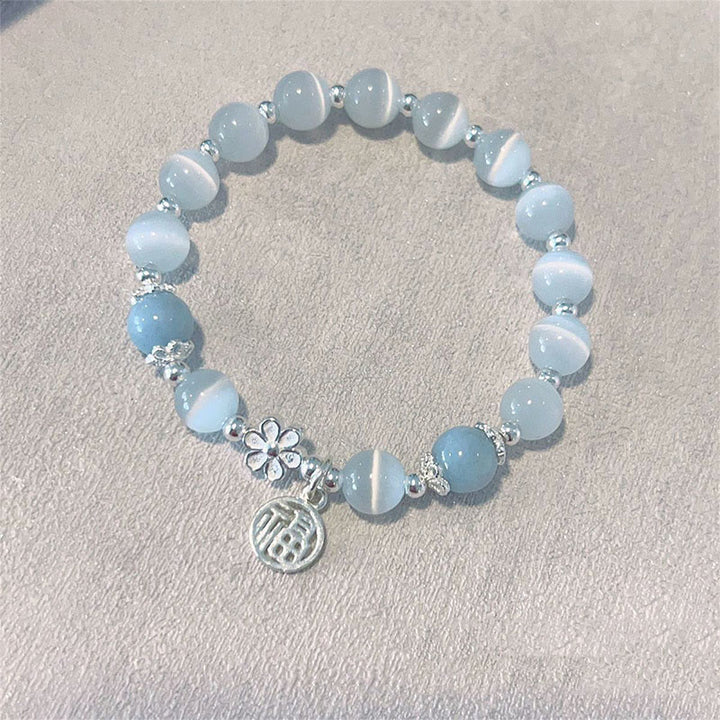 Buddha Stones Cat's Eye Crystal Peach Blossom Bell Fu Character Charm Support Bracelet - Cat's Eye&Blue Crystal(Wrist Circumference 14-16cm) - image 4