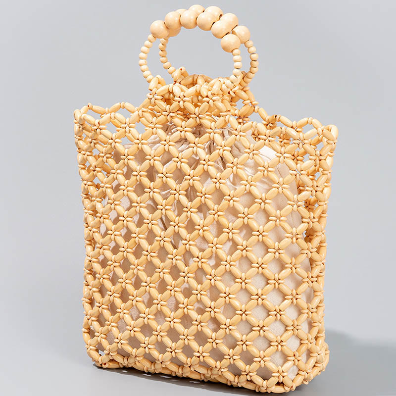 Buddha Stones Hand-woven Fishing Line Braiding Mesh Hollow Wooden Beads Handbag - image 1