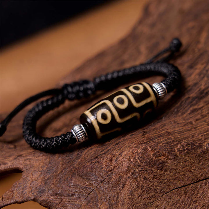 Buddha Stones Tibetan Nine-Eye Dzi Bead Three-eyed Dzi Bead Wealth Protection Rope Bracelet - image 1