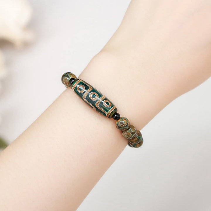 Buddha Stones Tibetan Nine-eye Dzi Bead Natural Sandalwood White Cat's Eye Agate Power Protection Bracelet - image 4