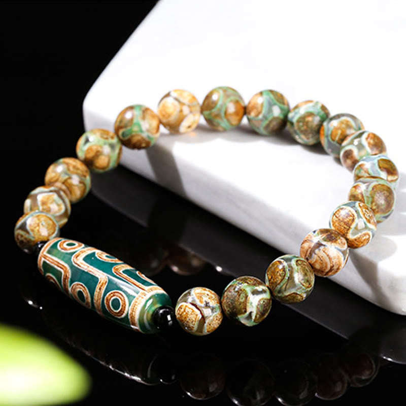 Buddha Stones Tibetan Nine-eye Dzi Bead Natural Sandalwood White Cat's Eye Agate Power Protection Bracelet - image 1