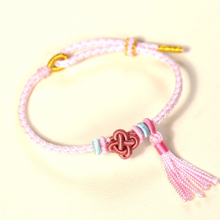 Buddha Stones Colorful String Peach Blossom Knot Tassels Protection Bracelet - Pink String(Wrist Circumference: 15-17cm) - image 1