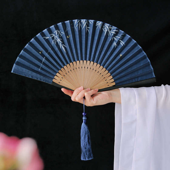 Buddha Stones Firefly Bamboo Leaves Pattern Tassels Handheld Bamboo Folding Fan - Navy Firefly Bamboo 22.5cm - image 0