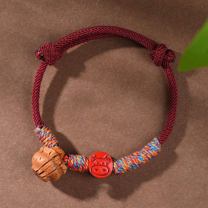 Buddha Stones Handmade Chinese Zodiac Red String Peach Pit Cinnabar Luck Bracelet - Ox - Red Rope(Wrist Circumference: 14-17cm) - image 11
