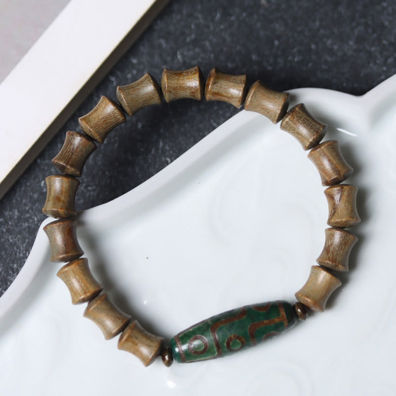 Buddha Stones Tibetan Nine-Eye Dzi Bead Green Sandalwood Peace Bracelet - image 1