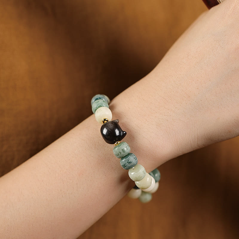 Buddha Stones Bodhi Seed Om Mani Padme Hum Carved Silver Sheen Obsidian Cat Head Wisdom Bracelet - image 13