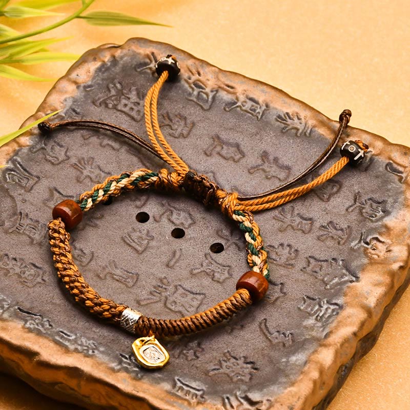 Buddha Stones Handmade Tibetan Zakiram Goddess Of Wealth Wood Protection Braided Bracelet - Yellow Rope(Wrist Circumference: 15-17cm) - image 0