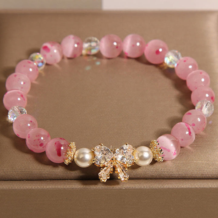 Buddha Stones Cherry Blossom Pink Cat's Eye Pearl Bow-knot Rosette Support Bracelet - Cat's Eye(Wrist Circumference 14-16cm) - image 0