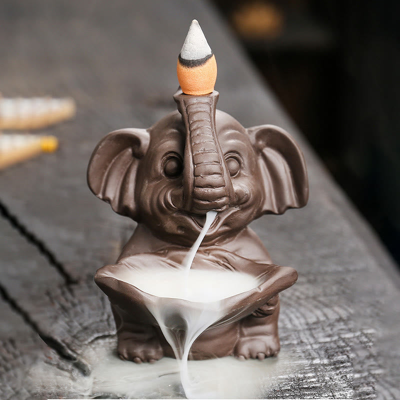 Buddha Stones Little Elephant Holding Leaf Purple Clay Backflow Smoke Fountain Healing Incense Burner Decoration - 7.4*7.9*10.5cm - image 0