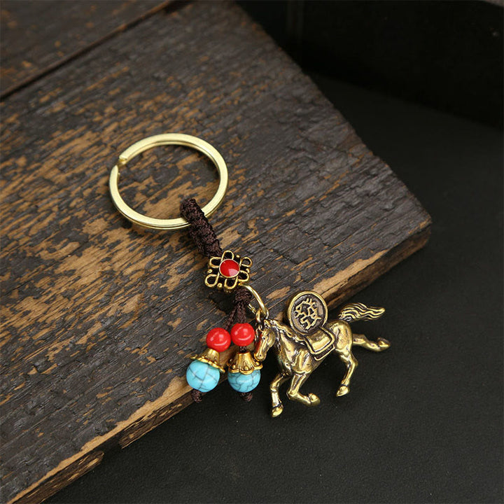 Buddha Stones Year Of The Horse Copper Brass Five-Emperor Coins Wealth Key Chain - Brown String Blue Bead Horse - image 0