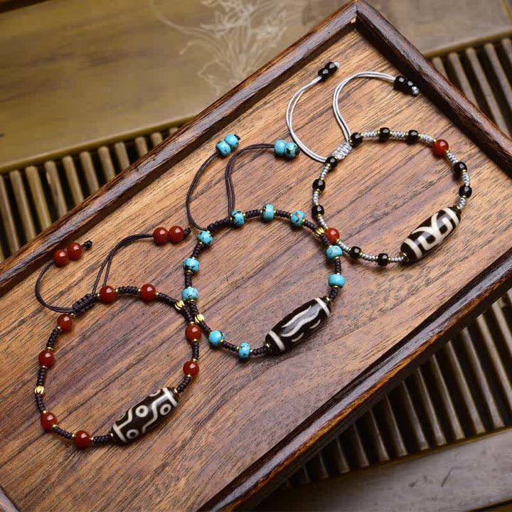Buddha Stones Dzi Beads South Red Agate Braided Rope Protection Bracelet - image 0