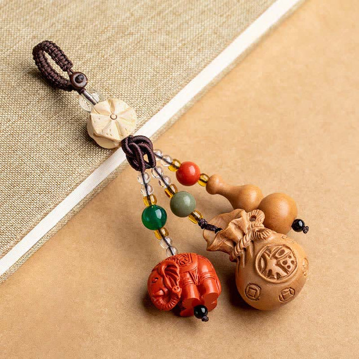 Buddha Stones Peach Wood Fu Character Money Bag Lucky Cinnabar Elephant Lotus Gourd Keychains - Peach Wood(Protection ♥ Purification) - image 0