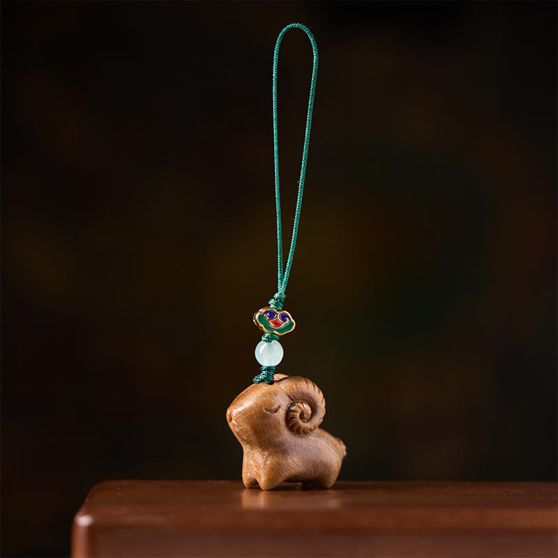 Buddha Stones Hand Carved Sandalwood Goat Positive Keychains - image 1