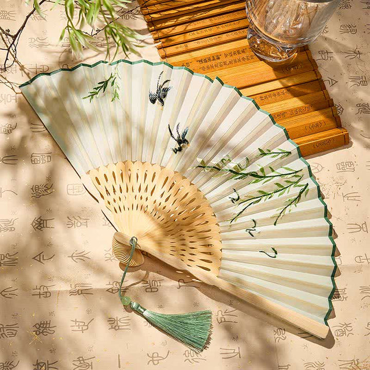 Buddha Stones Vintage Bamboo Orchid Willows Swallows Floral Pattern Growth Tassel Bamboo Folding Fan - Willows Swallows(Closed Size: Approx. 21 cm / 8.3 in) - image 0