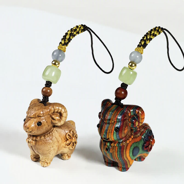 Buddha Stones Rainbow Eucalyptus Sandalwood Goat Serenity Hand-Carved Keychains - image 0