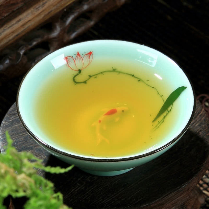 Buddha Stones Hand-Painted Celadon Ceramic Lotus Koi Douli Tea Cup - image 0