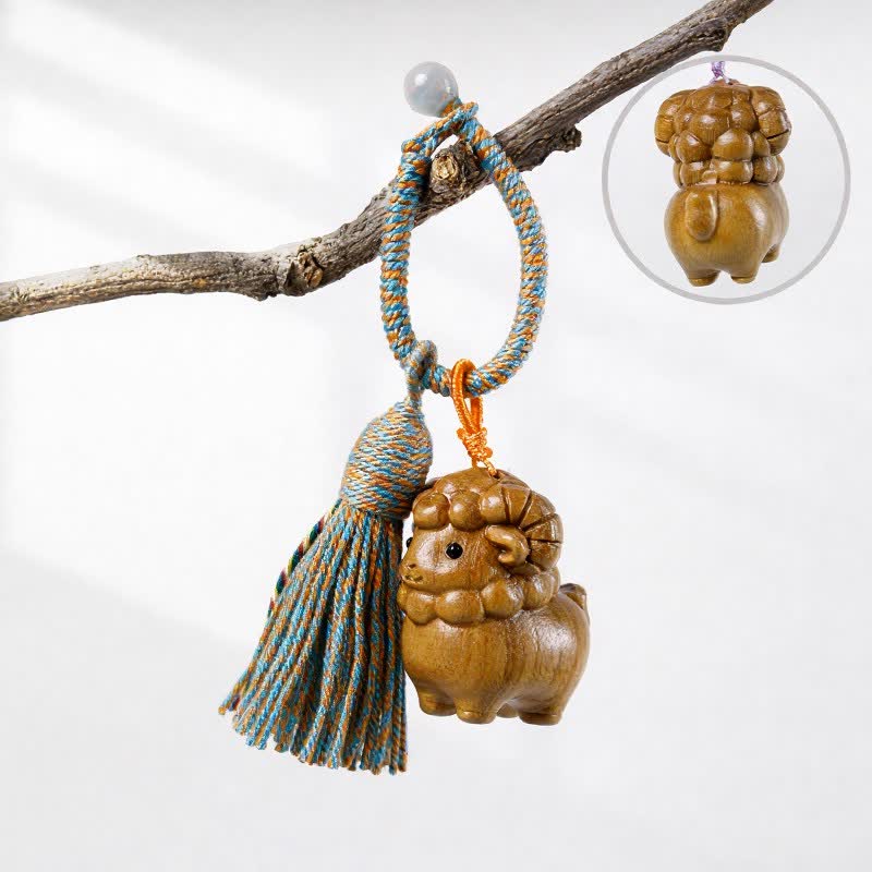 Buddha Stones Hand-Carved Green Sandalwood Rainbow Eucalyptus Goat Luck Tassel Keychains - Green Sandalwood - Orange Blue - image 1