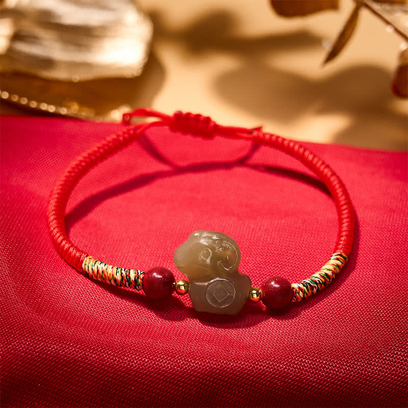 Buddha Stones Year of the Goat Hetian Jade Goat Charm Cinnabar Protection Braided String Bracelet - image 1