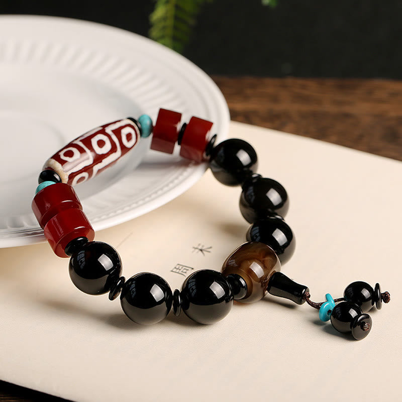 Buddha Stones Tibetan Nine-Eye Dzi Bead Black Onyx Wealth Protection Bracelet - image 1