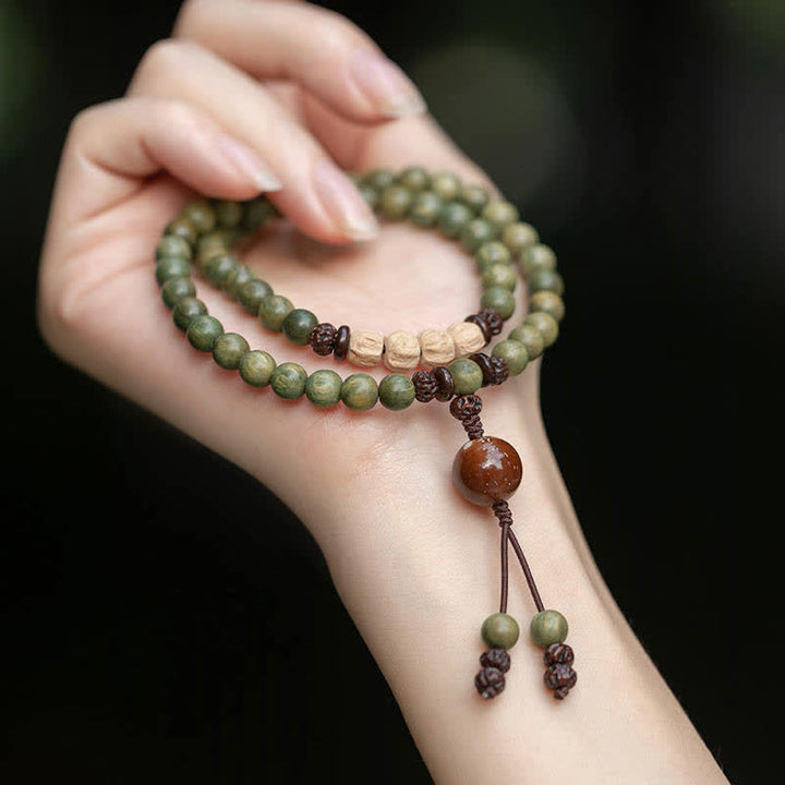 Buddha Stones Green Sandalwood Positive Peace Bracelet - image 0
