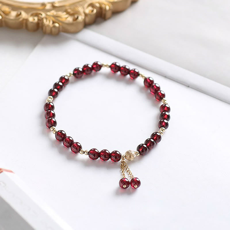 Buddha Stones 14K Gold Natural Garnet Calm Bracelet - image 1