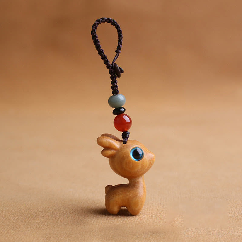 Buddha Stones Sandalwood Small Leaf Red Sandalwood Ebony Wood Green Sandalwood Lucky Mini Deer Carved Protection Key Chain Phone Hanging Decoration - Sandalwood 35mm - Key Chain - image 0