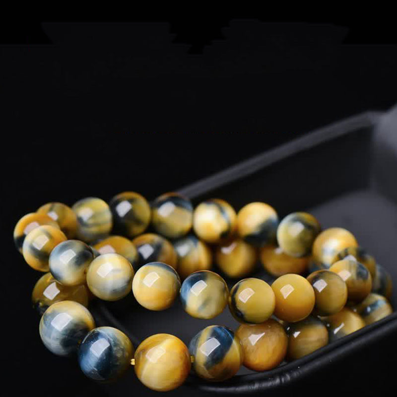 Buddha Stones Tiger Eye Protection Courage Strength Bracelet - image 0