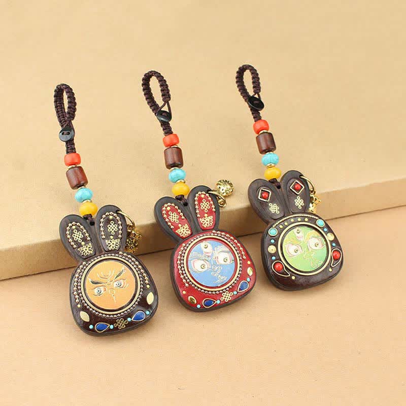 Tibet Ebony Five God of Wealth Thangka Key Chain - image 0