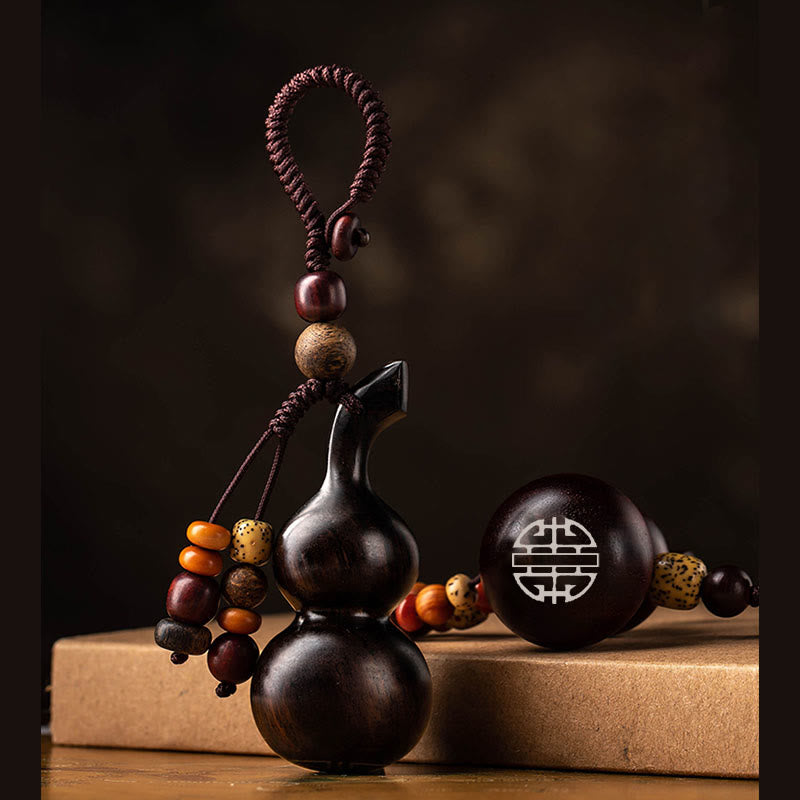 Tibetan Ebony Small Leaf Red Sandalwood Gourd Luck Protection Key Chain - Ebony Vertical Gourd - image 0