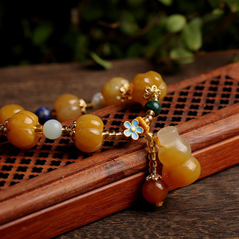 Buddha Stones Golden Silk Jade Pixiu Wealth Bracelet - image 1