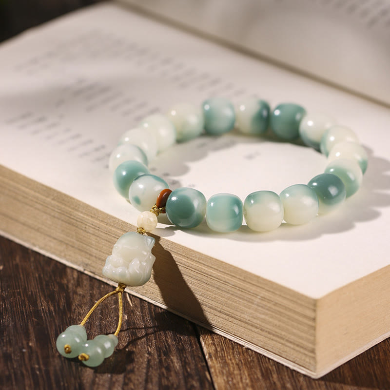 Buddha Stones Gradient Bodhi Seed Nine Tailed Fox Cat Paw Claw Pine Cone Peace Bracelet - Nine-Tailed Fox(Nine-Tailed Fox Random Color-Wrist Circumference 16-17cm) - image 0