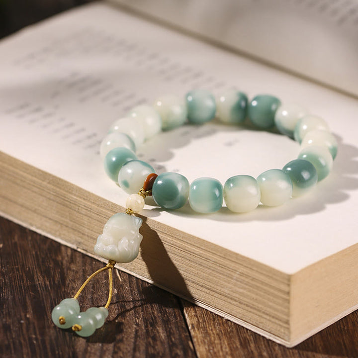 Buddha Stones Gradient Bodhi Seed Nine Tailed Fox Cat Paw Claw Pine Cone Peace Bracelet - Nine-Tailed Fox(Nine-Tailed Fox Random Color-Wrist Circumference 16-17cm) - image 0