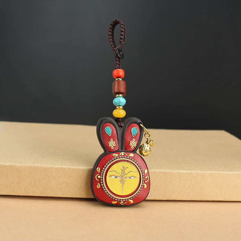Tibet Ebony Five God of Wealth Thangka Key Chain - Yellow God of Wealth - image 1