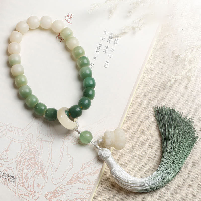 Buddha Stones Natural Gradient Bodhi Seed Fortune Money Bag Lotus Wisdom Tassel Wrist Mala - Bodhi Seed Fortune Money Bag - image 0