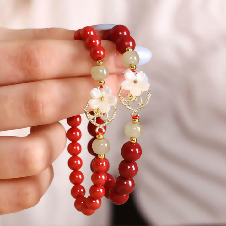 Buddha Stones Natural Cinnabar Jade Beaded Tridacna Stone Flower Blessing Bracelet - image 1